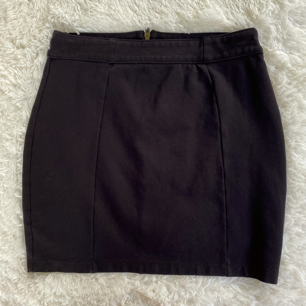 Black Mini Skirt with slit in the back and zipper in Size Medium